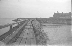 1925
Houten pier havenhoofd bij Kasteel
